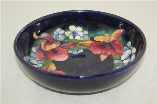 A Moorcroft Spring Flowers pattern bowl, post-war, 27.5cm